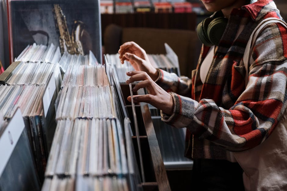 DJ flipping through a crate of vinyl records